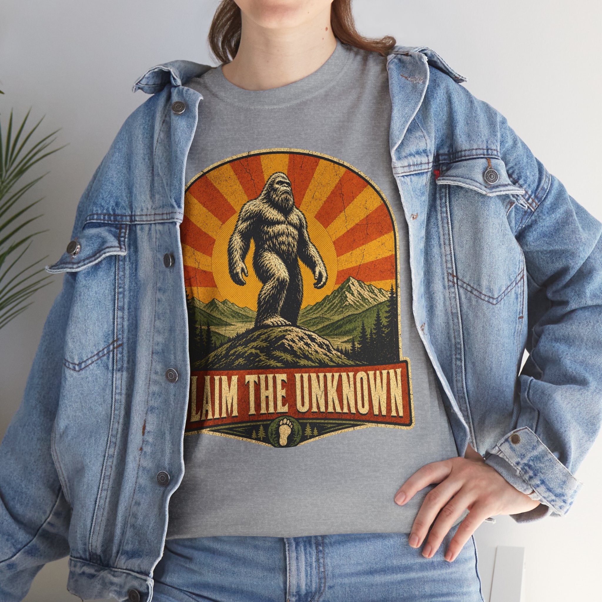 Claim The Unknown T-Shirt – Retro Bigfoot Sunburst Travel Poster Tee