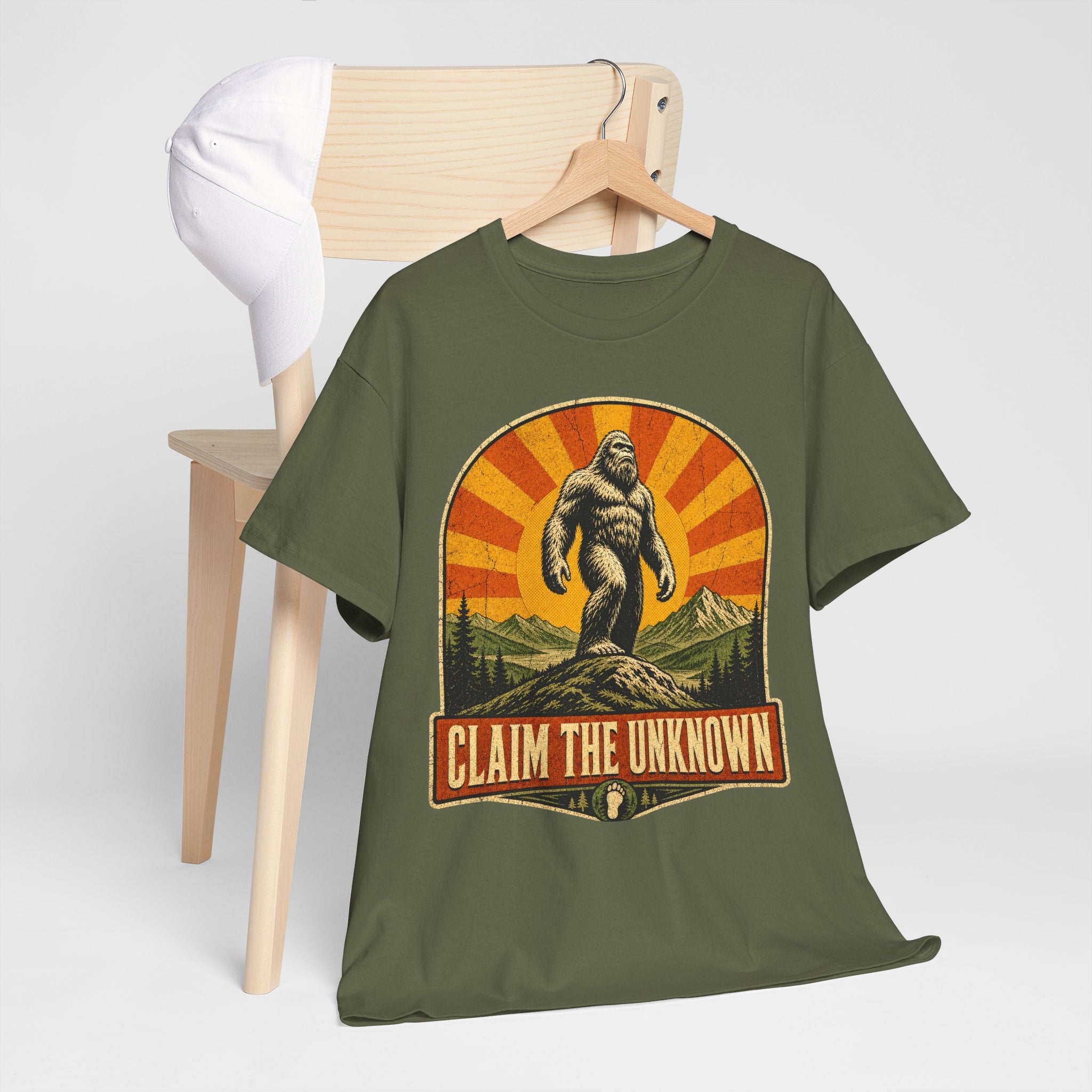 Claim The Unknown T-Shirt – Retro Bigfoot Sunburst Travel Poster Tee